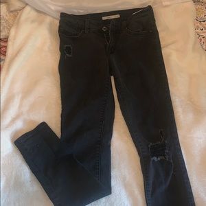 Black ripped skinny jeans